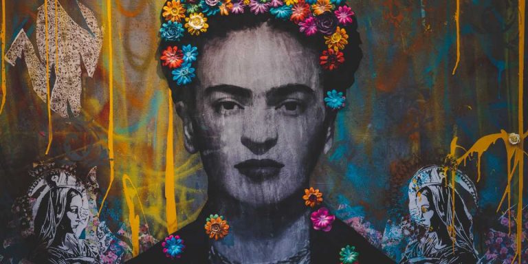 painting of woman with flowers braided into the hair on wall