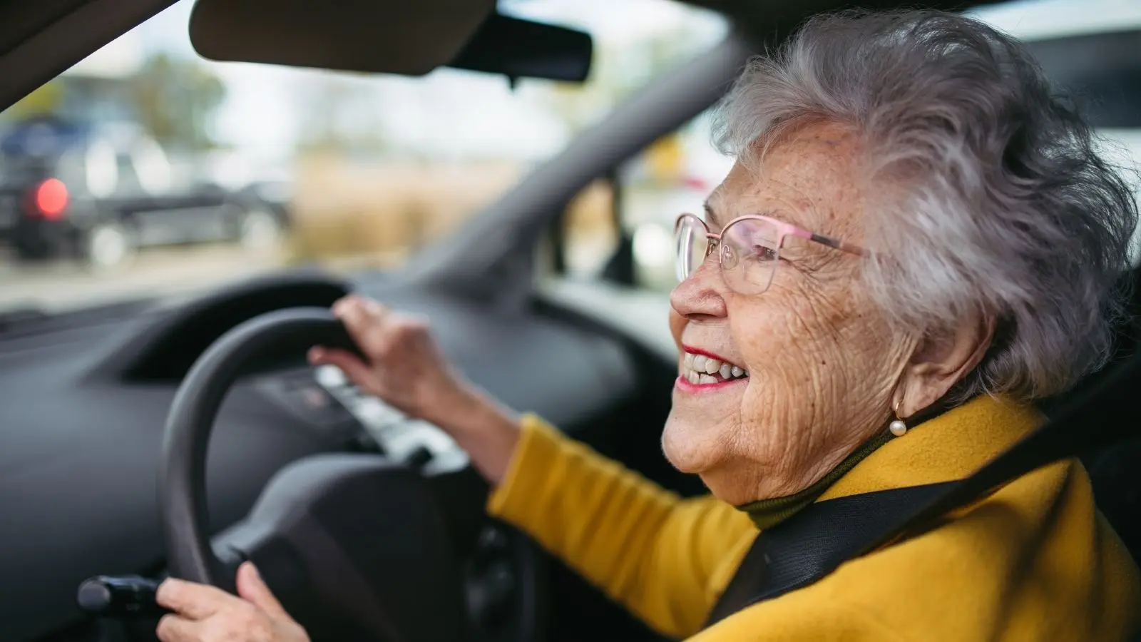 woman in her 80s driving